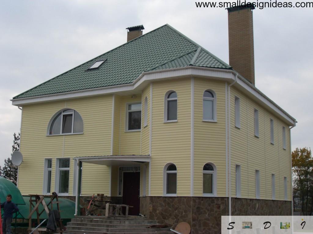 Yellow paneling French country style in house facade design