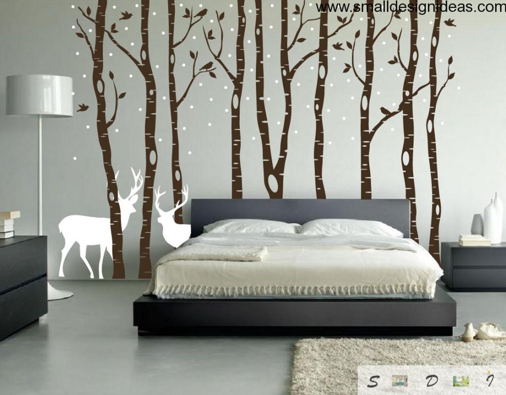 Country-side bedroom in light tones with deers and birch-trees