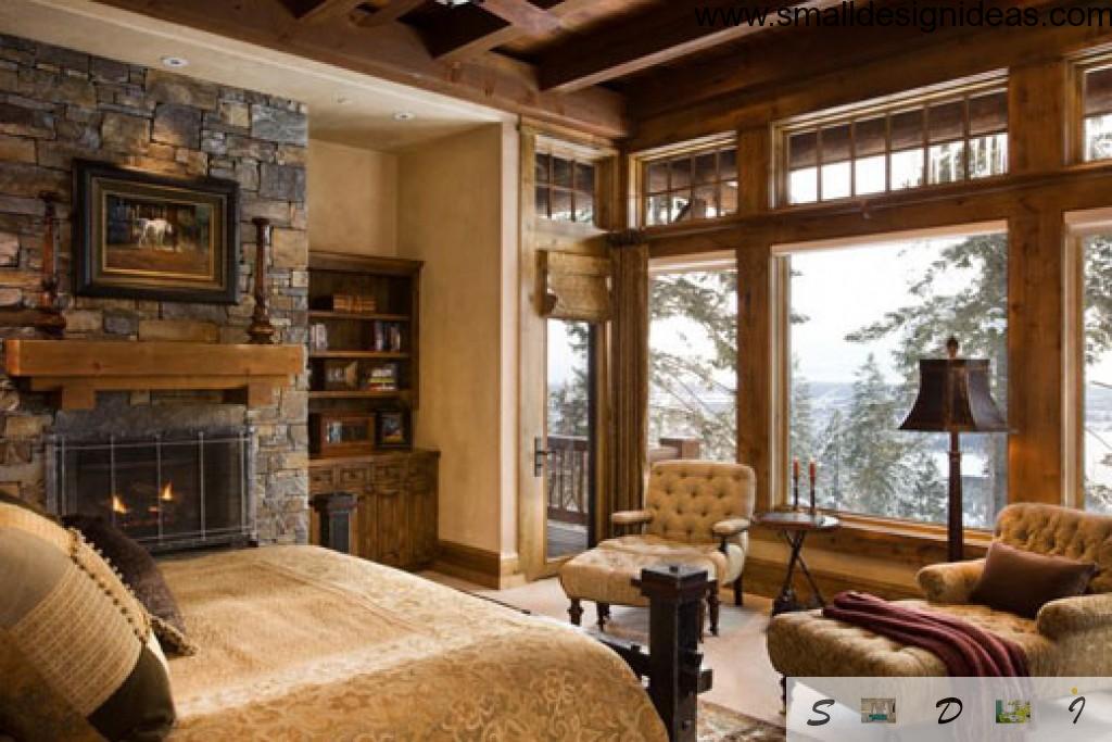 Wooden bedroom interior with stone fireplace