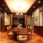 English Style dining room interior with artiicial light and a lot of wood