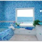 Fully thematic sea bathroom with mosaic tile in pleasant blue hues