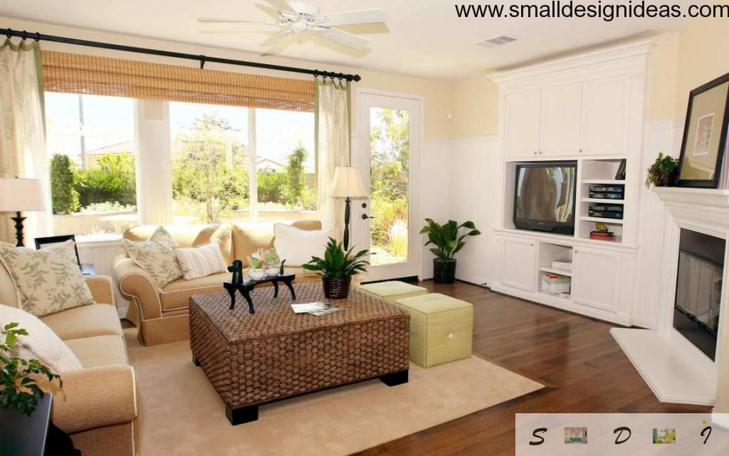 rattan square table in the casual style living room in a white tines with flowers and TV-set