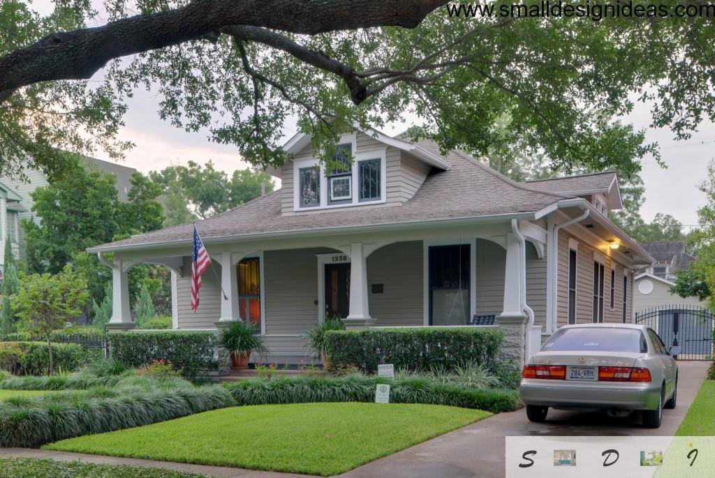 English style house with dark gray roof tile and grey panelled walls which is favourite for American townhouses