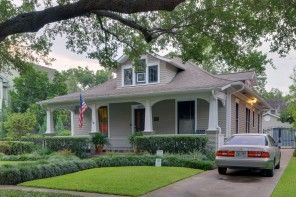 English style house with dark gray roof tile and grey panelled walls which is favourite for American townhouses