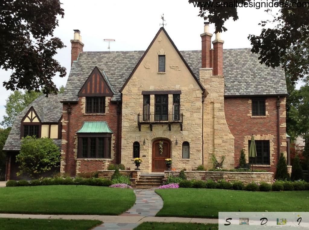 castle-like house in Tudor style with sandy finishing and a couple of chimneys