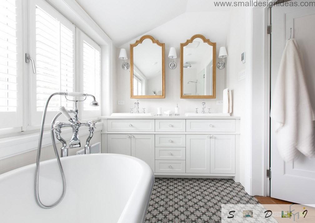 Two mirrors and two sinks in the bathroom for large family