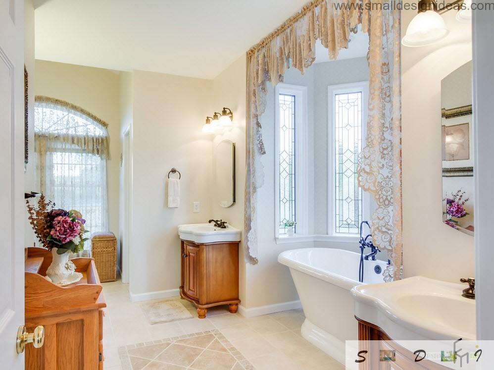 Wooden pieces of furniture in the classic and full if light bathroom design