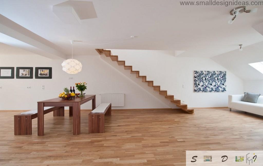 Unusual use of the stairs in the white and wooden theme of modern living room interior in the private house