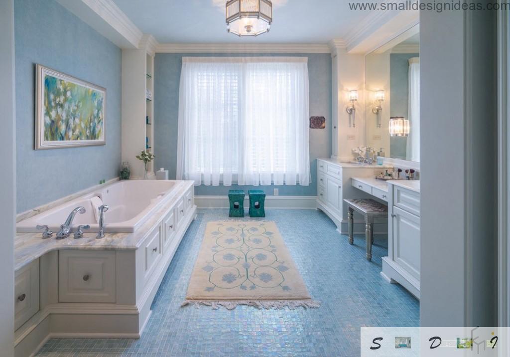 Blue mosaic tile floor and strict lines in the classic bathroom