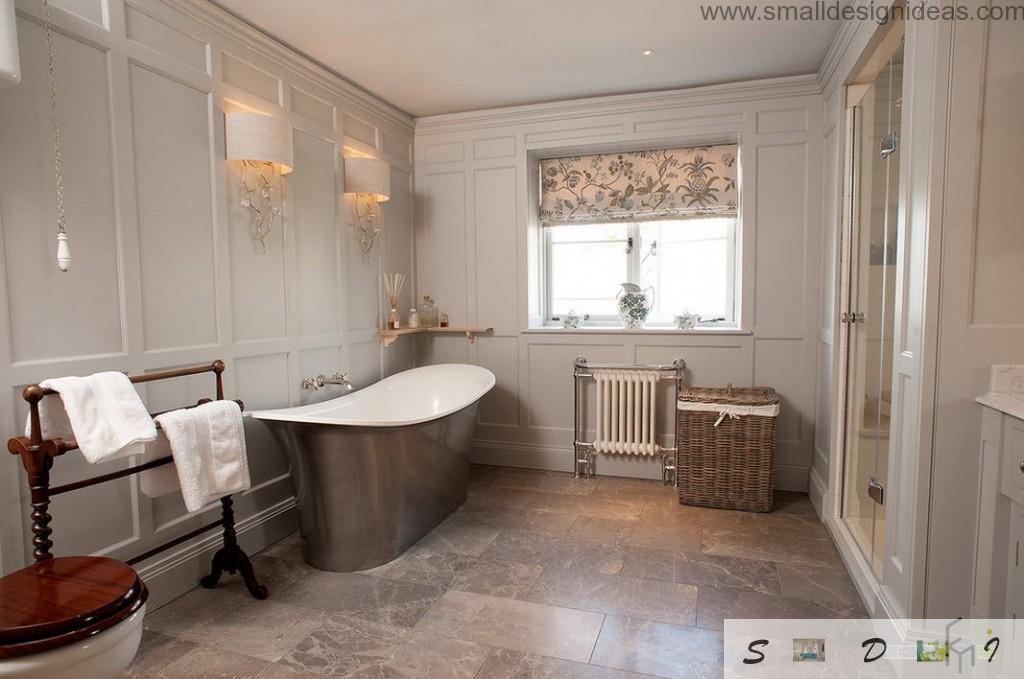 Steel glossy bathtub surface decorating th noble marble if the bathroom