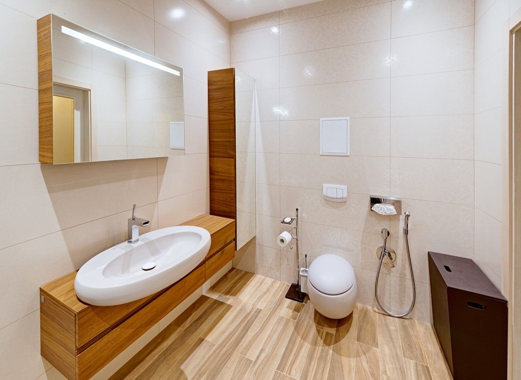 Bathroom in the eclectic style trimmed with wood