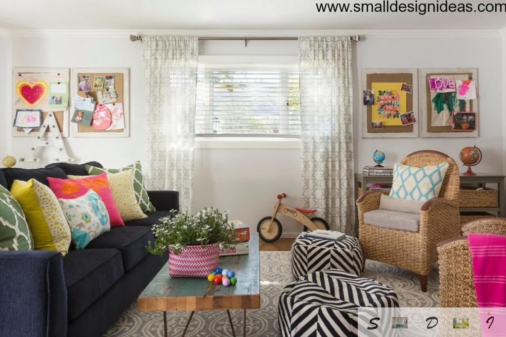 Black and white zebra puffs in the eclectic design of the living room with wide window