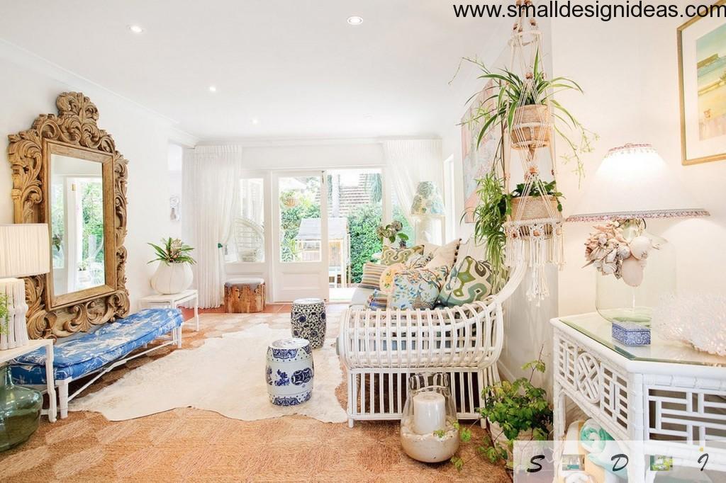 Creamy and green eclectic modern living room with fixtures at the white ceiling