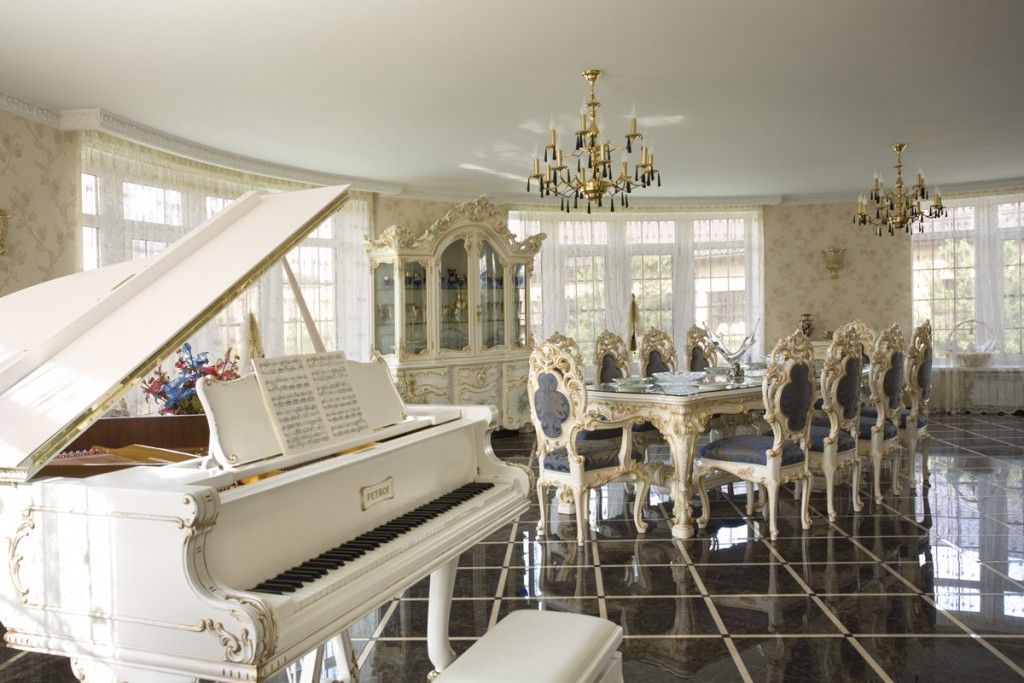 Baroque living room with dining area and piano for distinguished guests