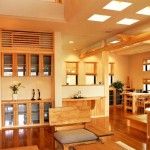 Fully wooden living room with the dining zone in Japanese minimalistic style