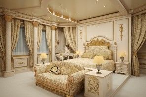 Chic bedroom in Empire style with painted and stylized furniture, trimmed suspended ceiling and gilded paints at the walls