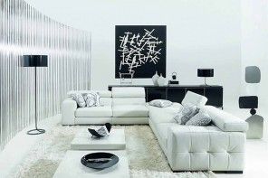 White furniture in black and white interior of the living room with wall expressionism