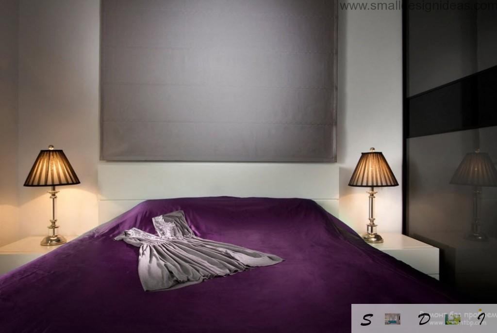 Simple design in the bedroom with purple cover on the bed