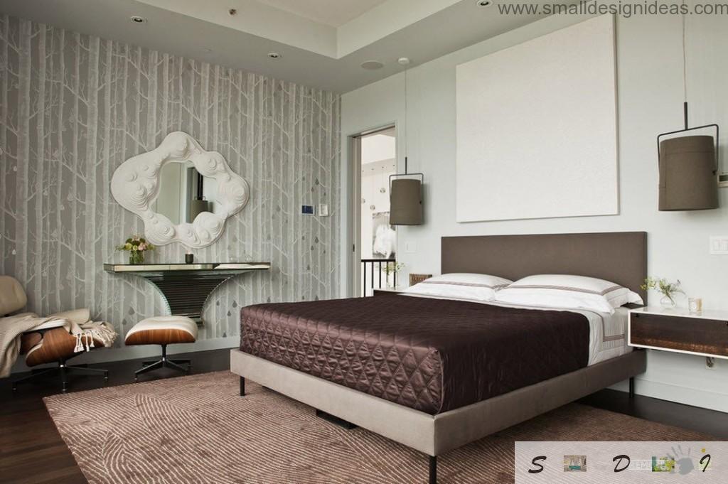 Black coffee mattress as decorative element in the light green wallpapered bedroom