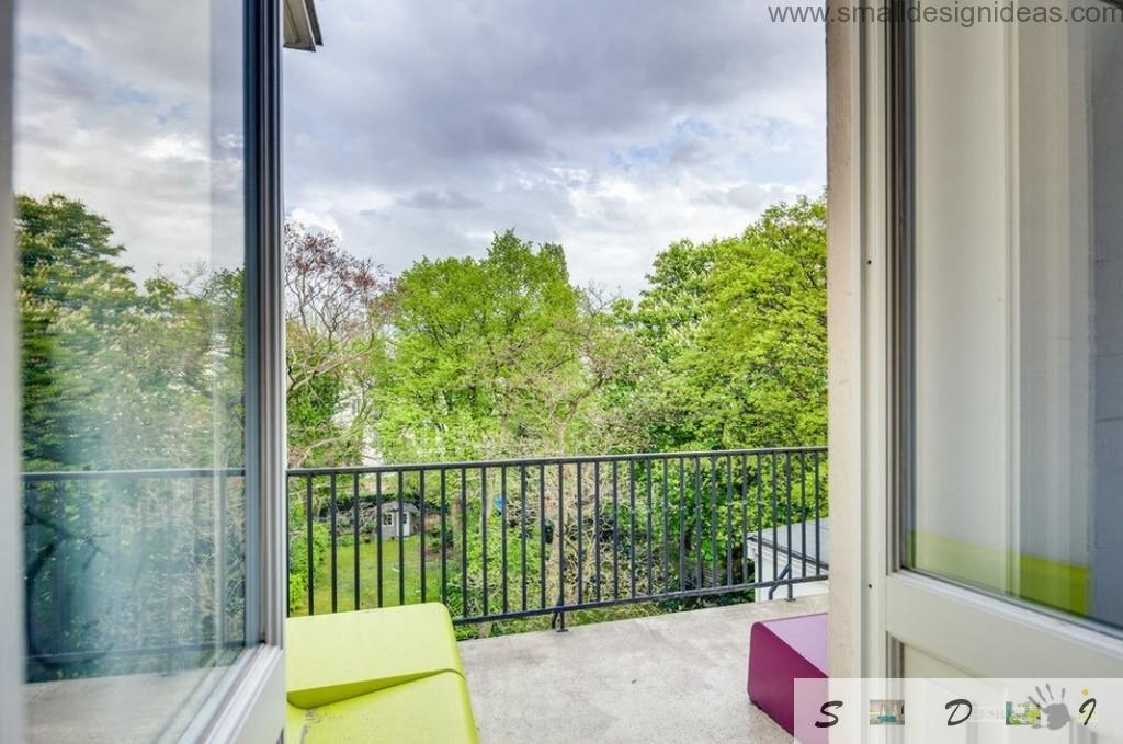 Nice view from the window to the balcony and nature in the cool modern German loft apartment