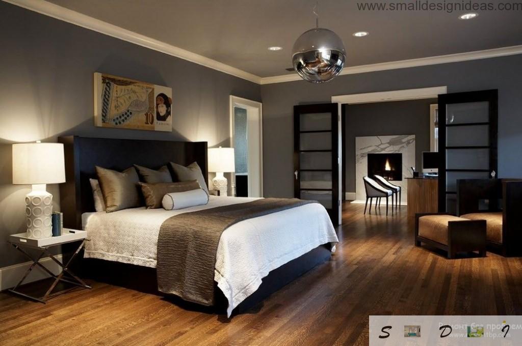 Wide bed in spacious royal dark modern bedroom 