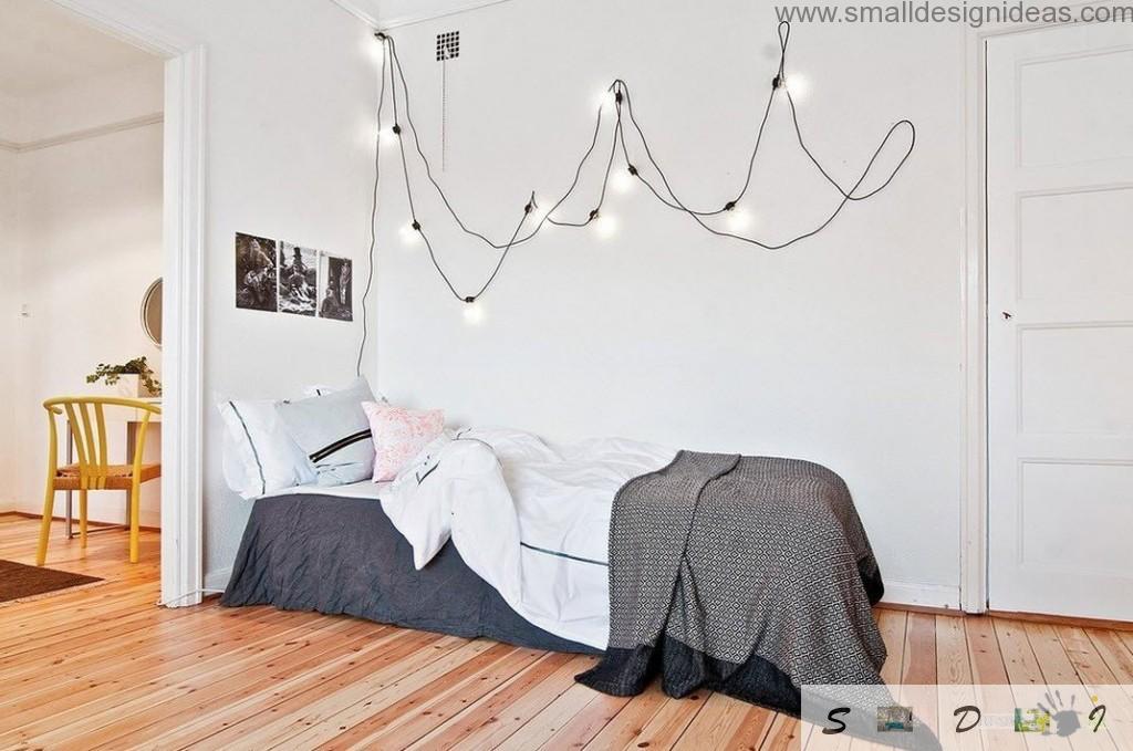 Wired garland wall decoration in the white bedroom