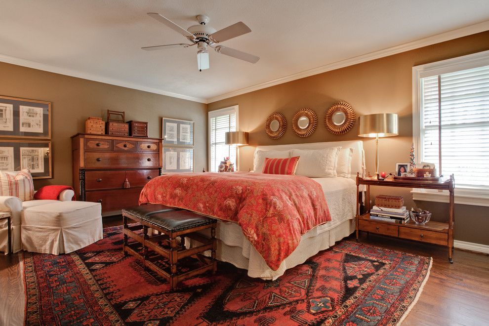 Red classic carpet and other elements for eclectic designed bedroom 