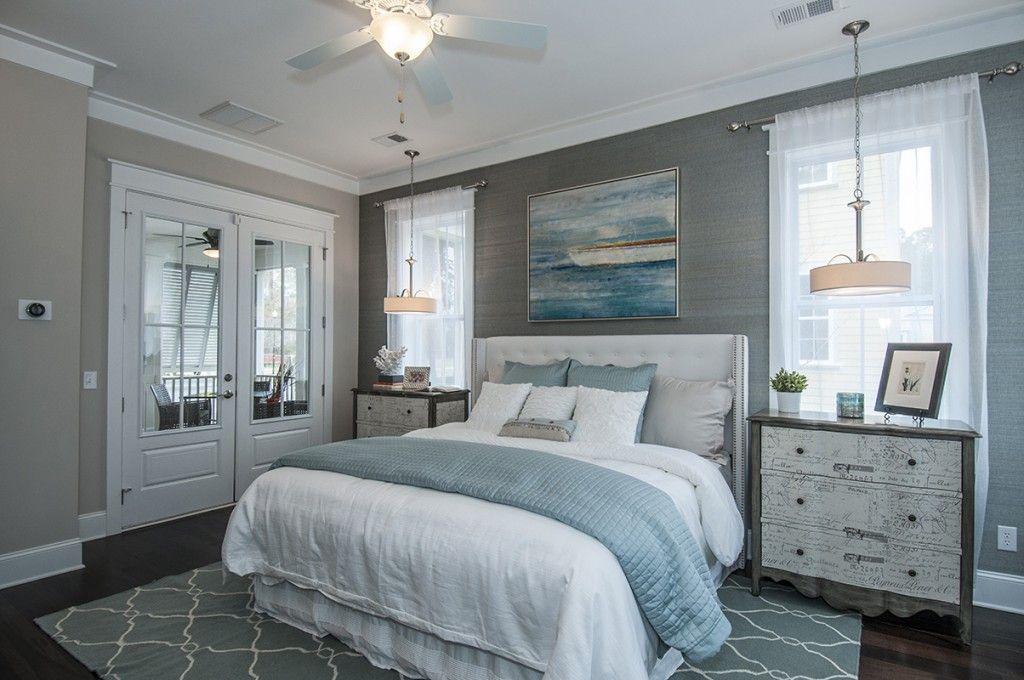 Soothing marine colors in the women`s bedroom interior