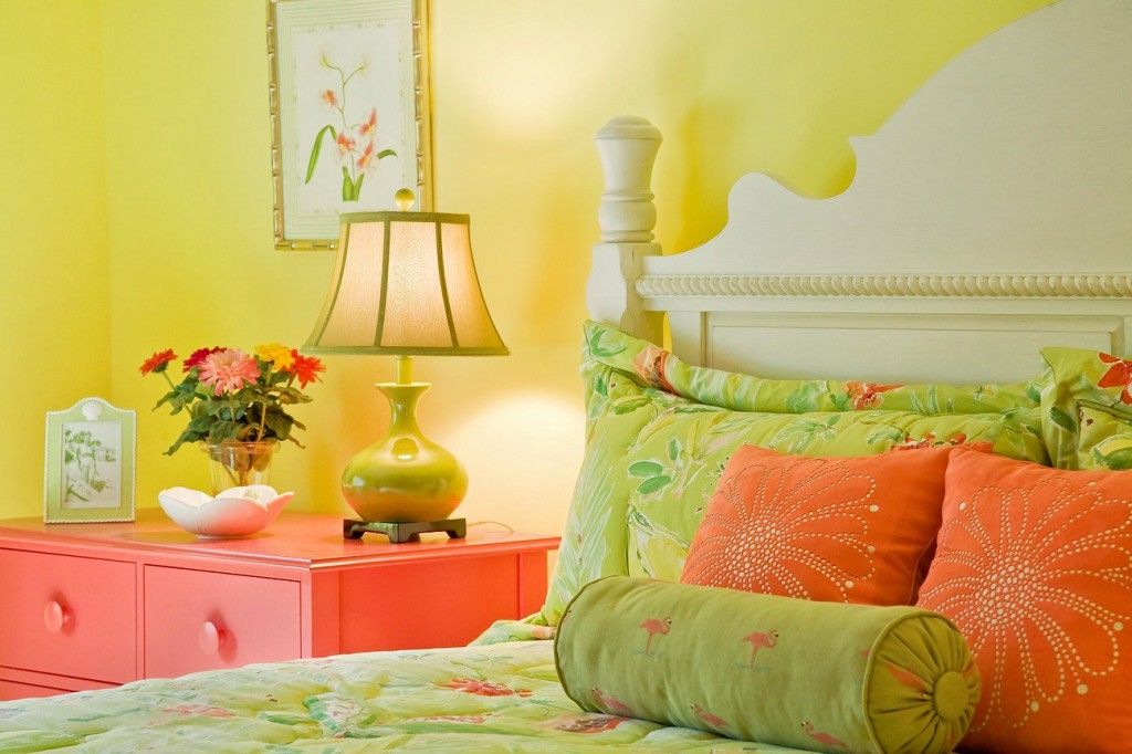 Bright green and yellow tones in the women`s bedroom