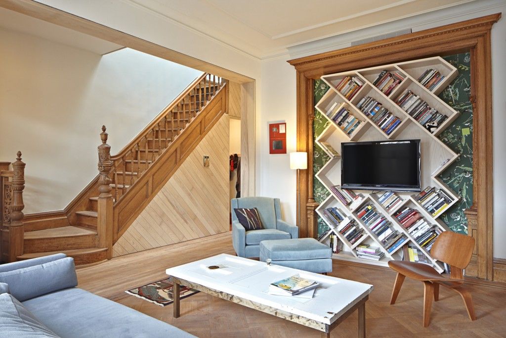 Nice Unusual Bookshelves Interior Decoration. Sloped rombic shelves behind the TV area