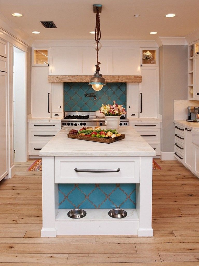 Mediterranean Interior Design Style. White neat outsdanding example of kitchen with the criss-cross facade decoration at the blue backdrop