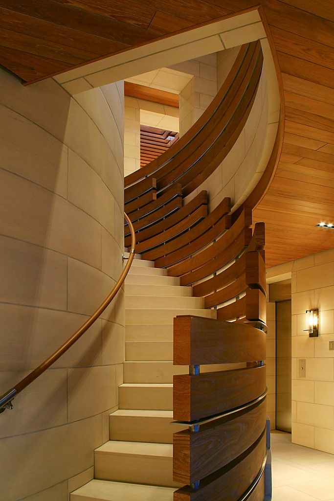 Staircase Modern Constructions Types Design. Nice curved stairs with original wooden handrails provides high level of safety