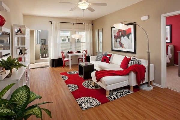 Red Color Interior Design Ideas. Carpet and coverlets in the living room