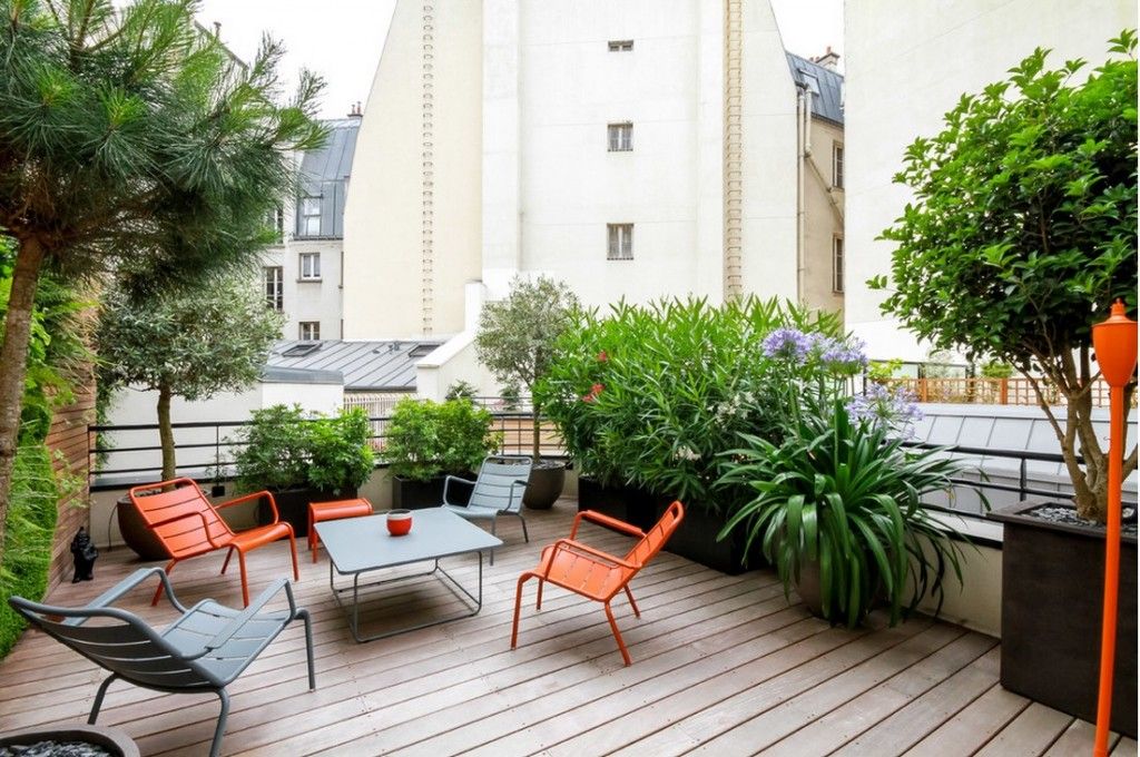 Plant Terrace Landscape Decoration Methods. Nice country view in the housing area with plastic sunbeds for friendly chat and relaxing