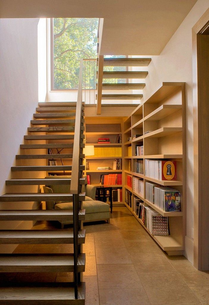 Staircase Modern Constructions Types Design. Library area under the wooden two-run stairway