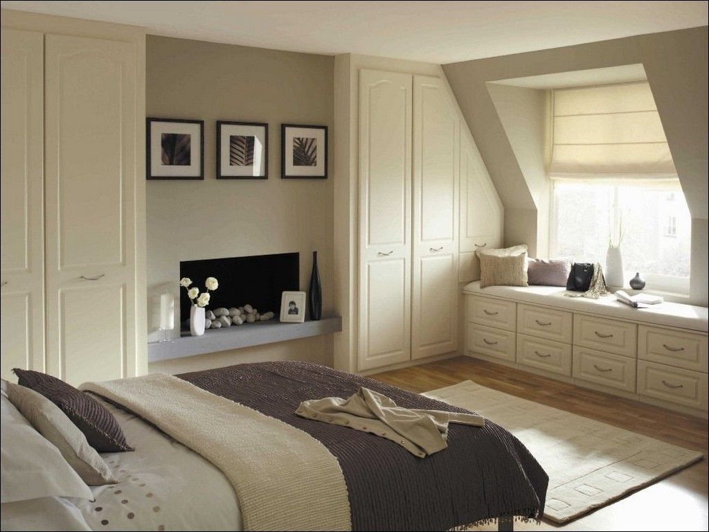 Dream Bedroom Wardrobe Decorating Ideas. Nice shitw neat atmosphere and sloped carved accordion doors for cabinets of the dressing