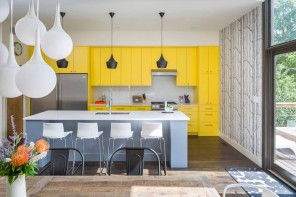 Bright Interior Design Ideas for Private House. Light vivid yellow kitchen with the dining area