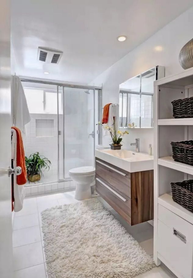 Small Bathroom Space Saving Vanity Ideas. Wooden trim of the drawer surfaces in the light utilitarian space