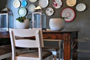 Decorative Plates on the Wall of the Dining room. Colorful accent on the dark beige wall