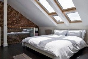 Loft Style Bedroom Design at the Attic. Double skylight construcion