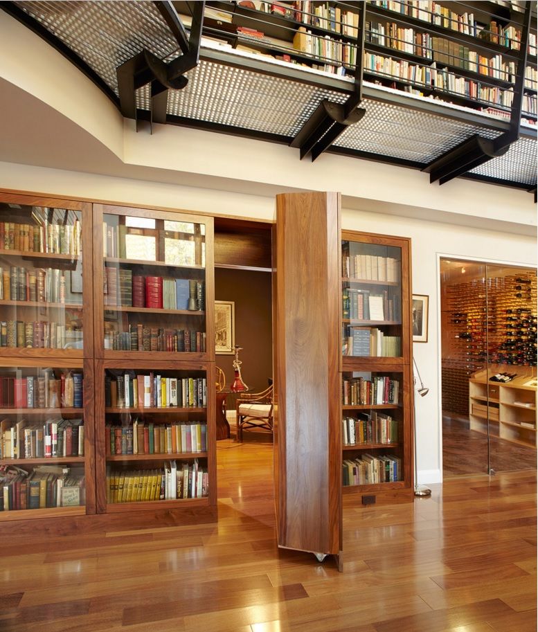 Secret Rooms with Hidden Doors Modern Design Ideas. Two-storey house with the entrance to the secret space in one of the library cabinets