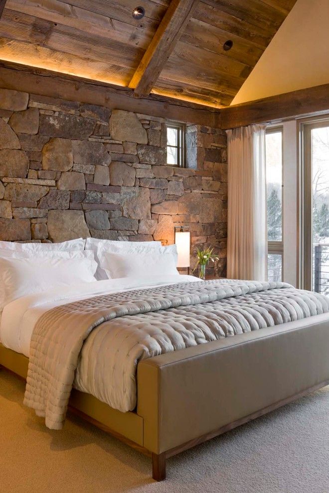 Stone decorated headboard in the bedroom