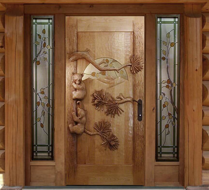 Carved Wooden Doors as Piece of Art in your Interior. Natural color of the entrance with peculiar carving on it