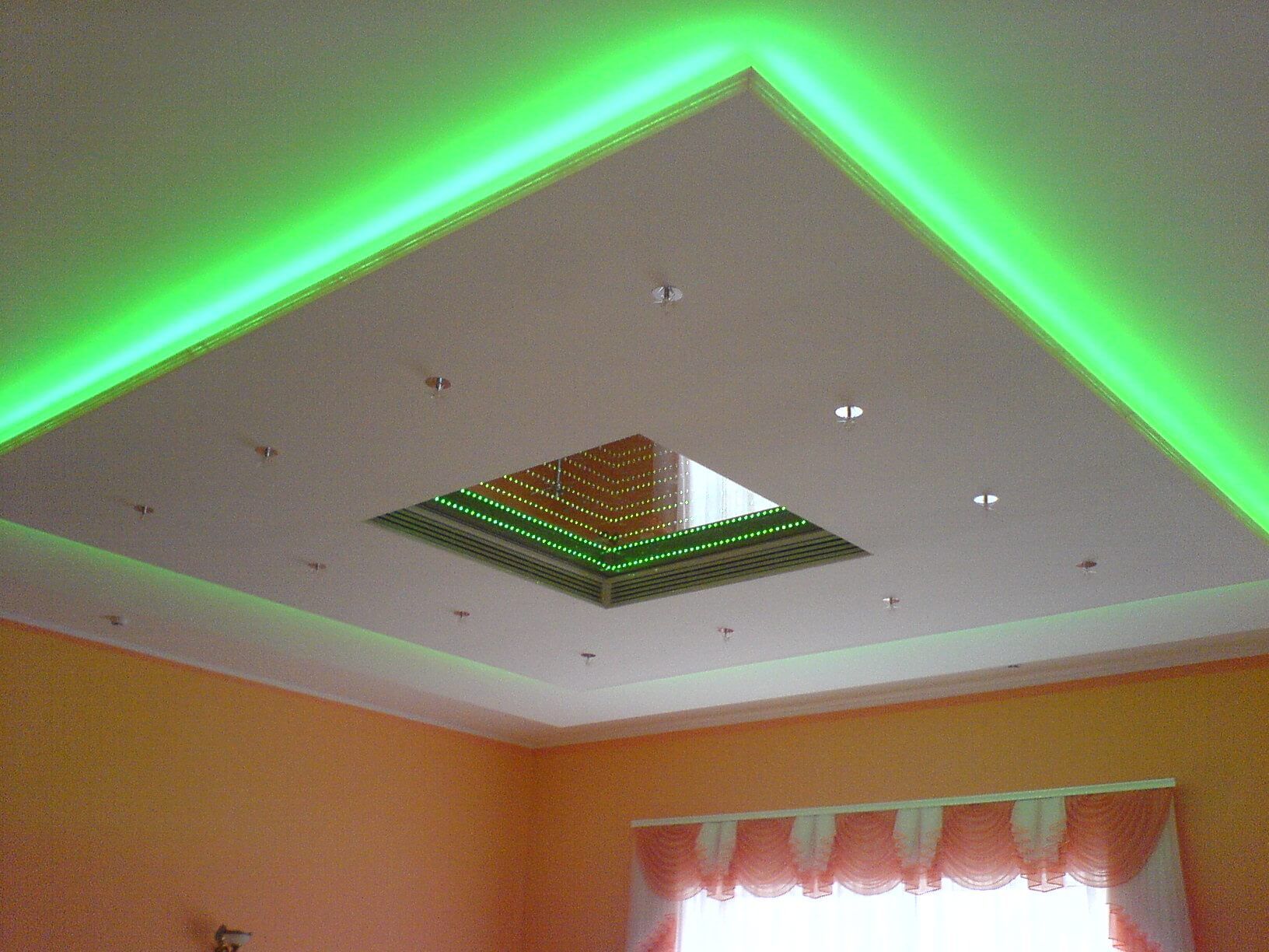 Plasterboard Ceiling Finishing Design Ideas for Apartment. Green neon backlight of the cosmic ceiling construction