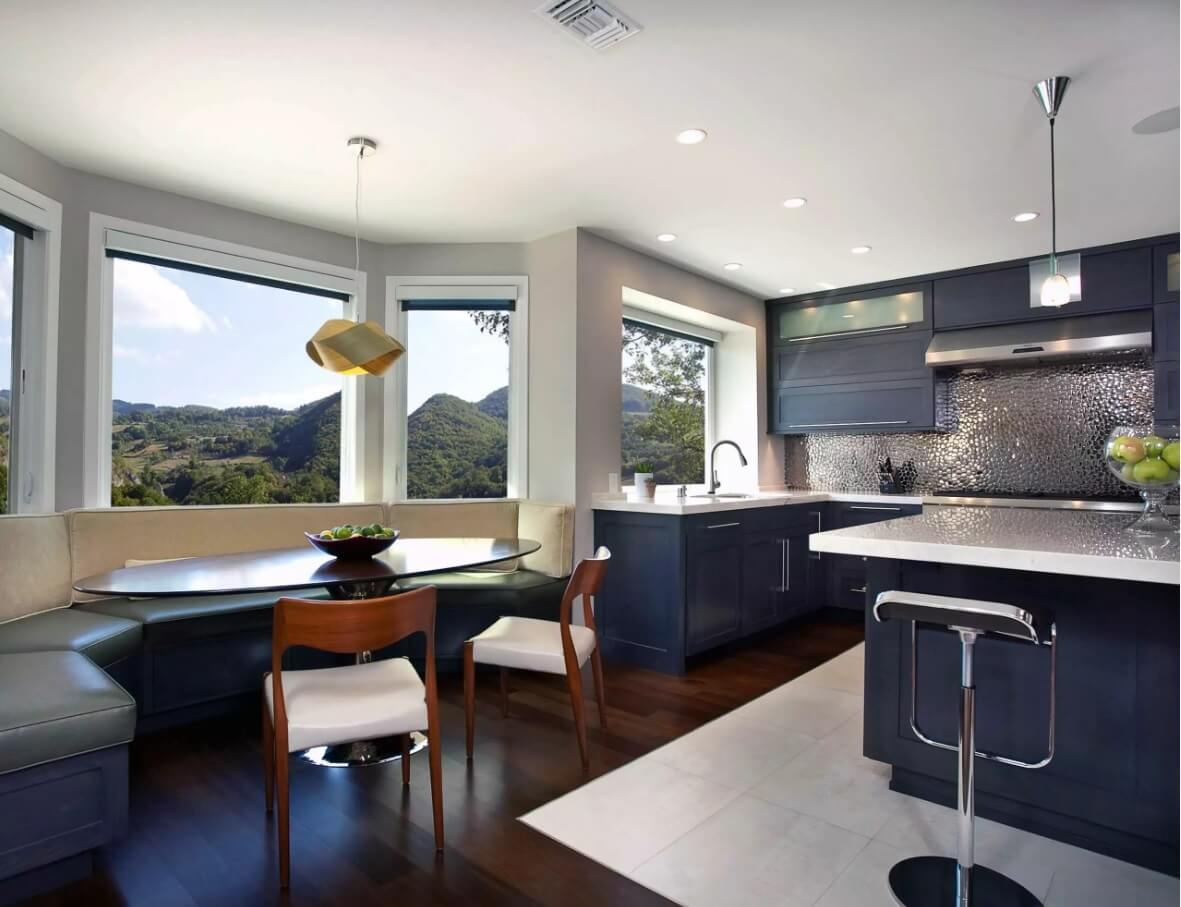 Metal Backsplash as Stylish Design Idea for Kitchen Interior. bay window room layout contributes to more light and brightness