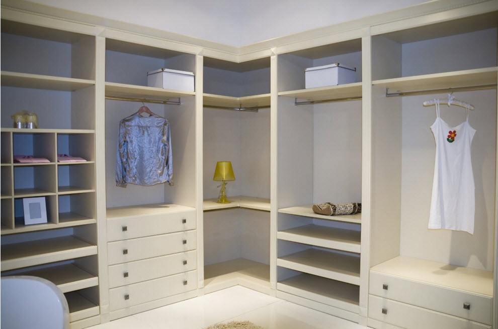 Corner Cabinet Types for Modern Bedroom Interior Design. Milky white angular custom wardrobe to store all the clothes