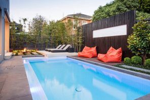 Orange frameless sunbeds at the serpentine pool