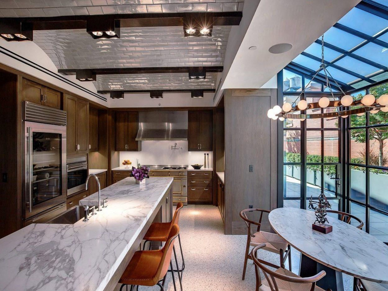 Spectacular glass decorated veranda and the large dining zone next to it
