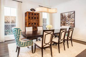 Classic interior design of the dining room with nice vintage wooden cupboard