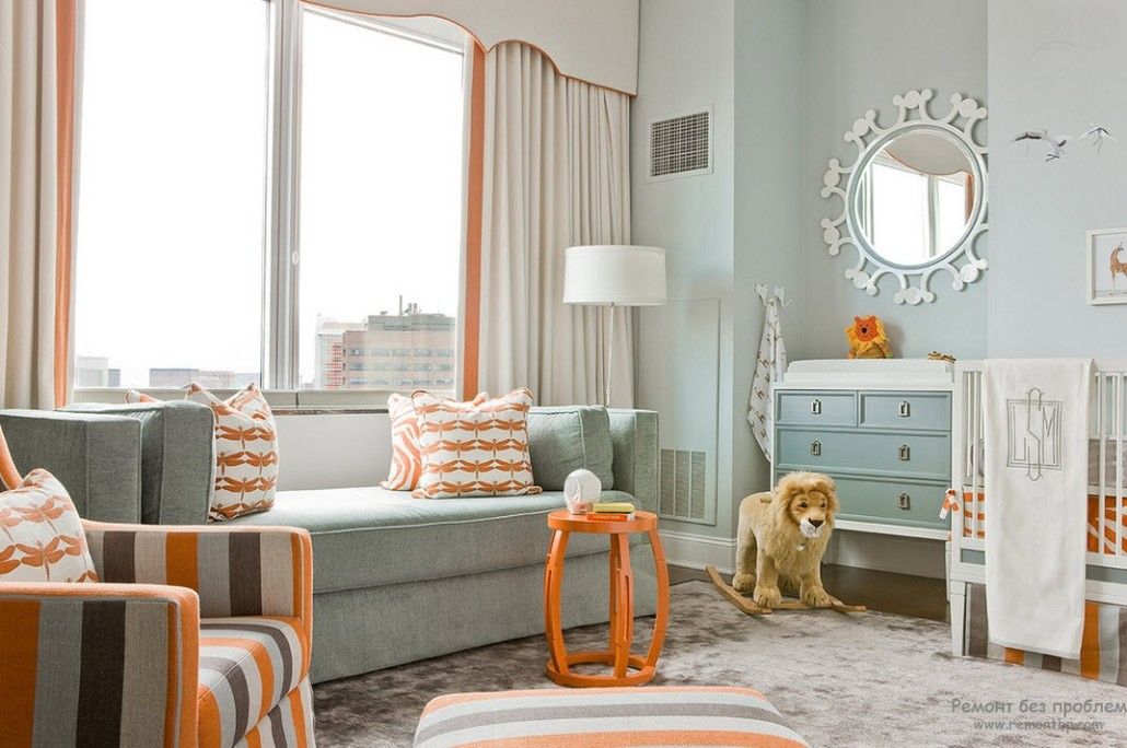 Orange decoration as a touch in the light fresh Modern deisgn of the living